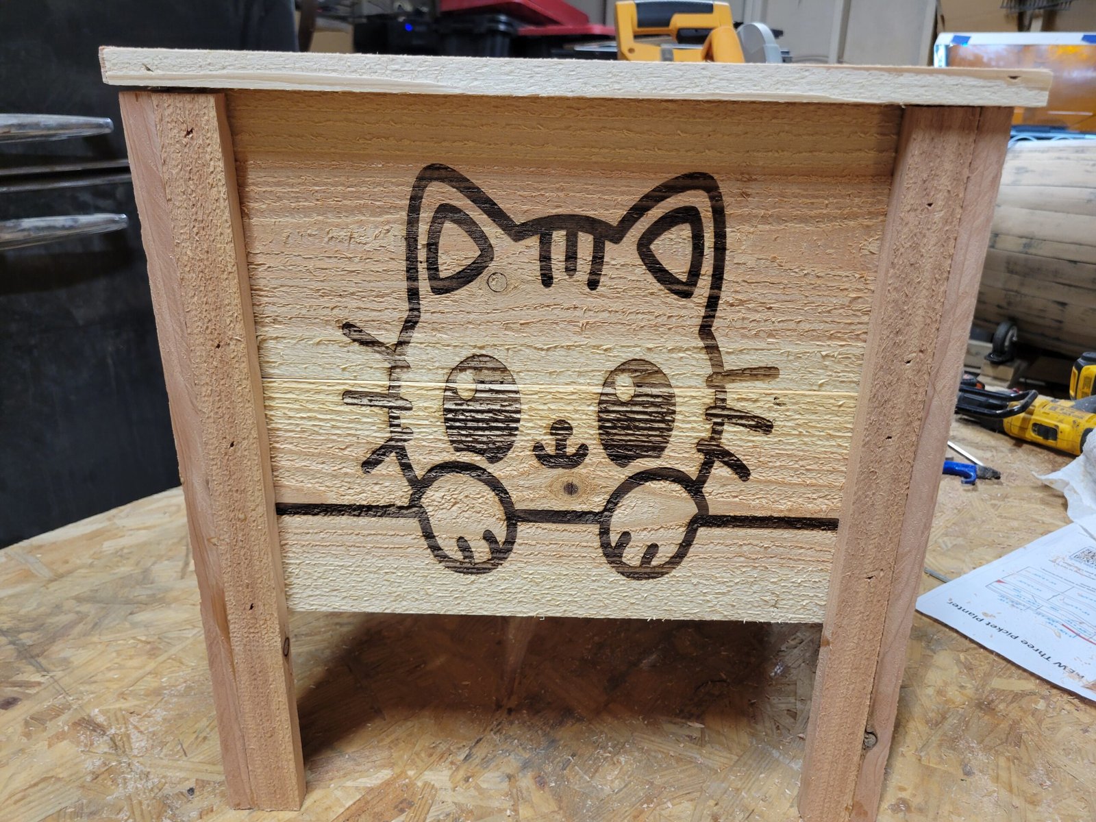 Three picket planter with cat wood-burn design