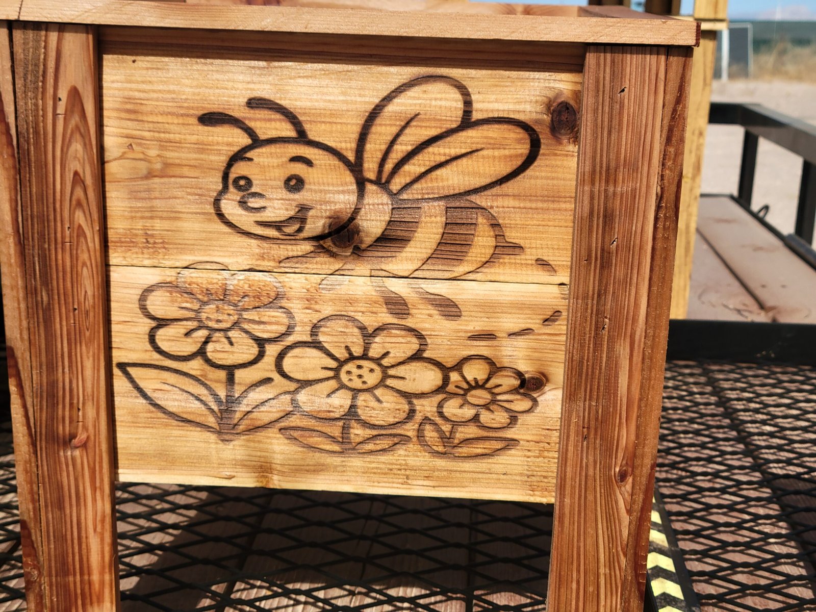 Bee and flowers wood-burned planter by Crafted Casks